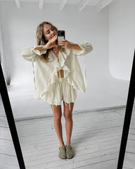 Solid Ruffled Lace-up Casual Top and Elastic Waisted Loose Pocket Shorts Set