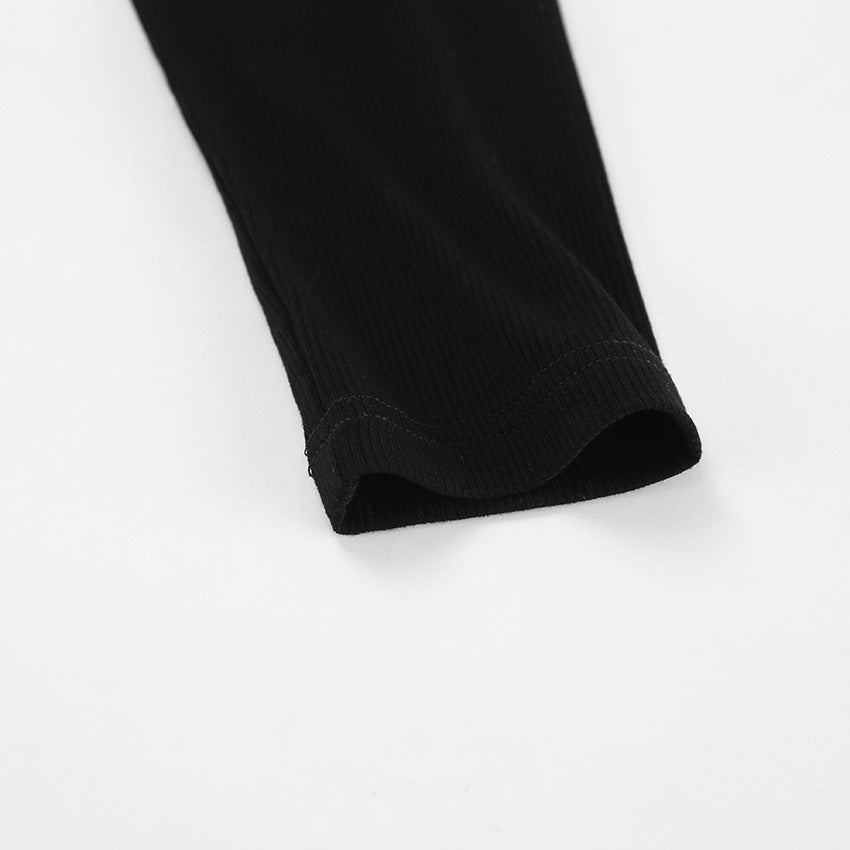 ASYMMETRIC CUTOUT BLACK KNIT TOP