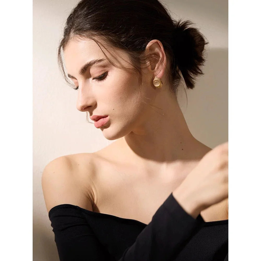 Gold Toned Textured Oval Stone Earrings